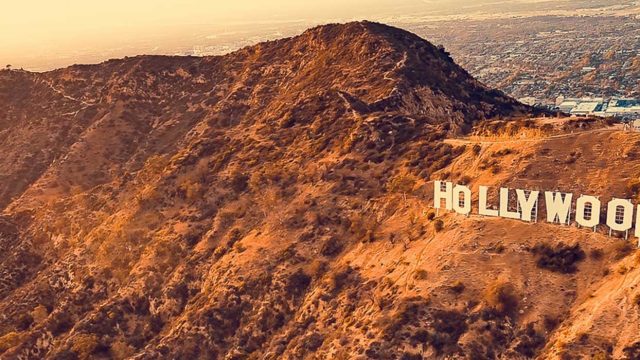Hollywood sign on the the brown mountains of Los Angeles, CA